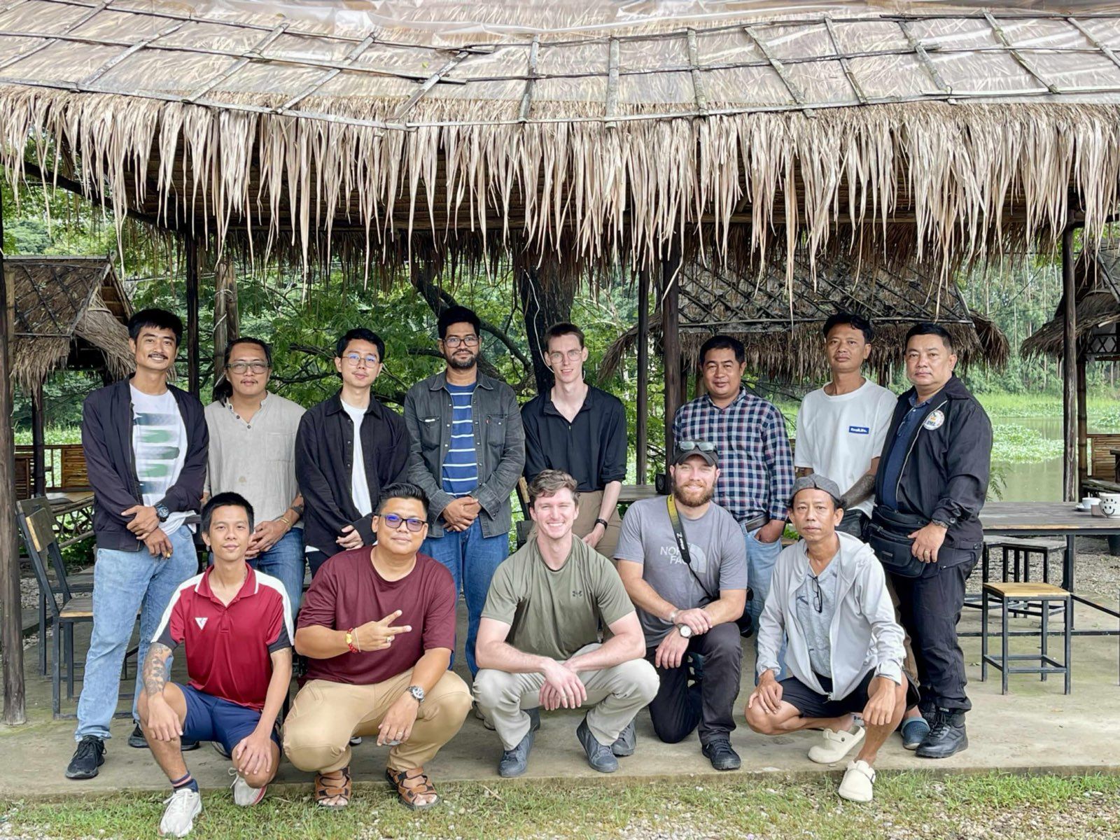 Group portrait of the training cohort and Peacemaker Coalition crew